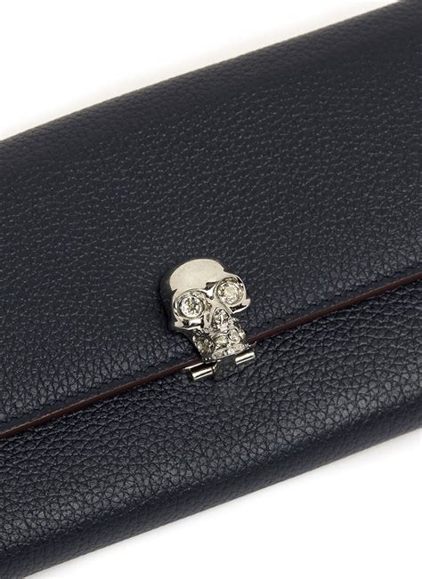 alexander mcqueen skull wallet.